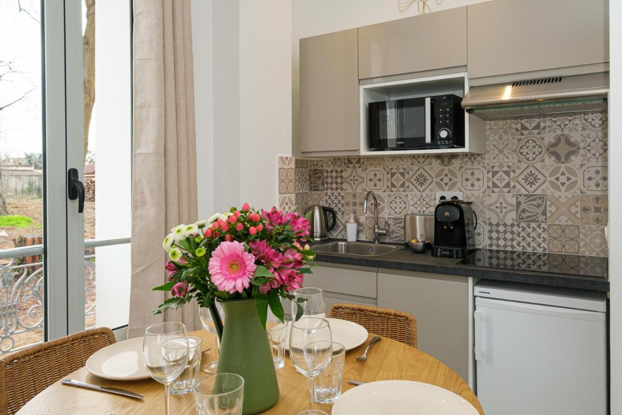 Villa Forestiere Appart Le Ginkgo Quincy-Voisins Bagian luar foto